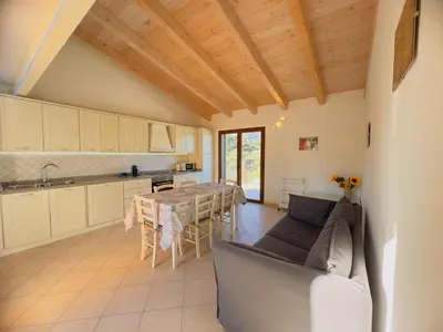 Cucina o angolo cottura di Domu Imbirdi - Vista panoramica sul mare