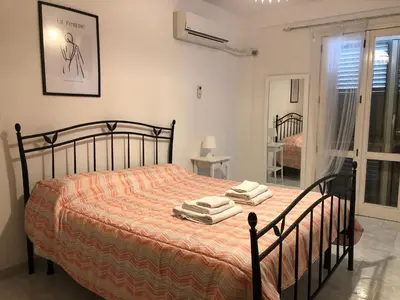 Letto o letti in una camera di Casa vacanze La stella marina
