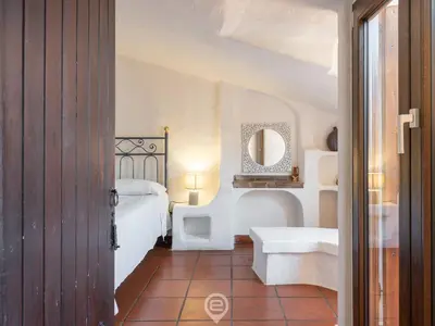 Letto o letti in una camera di Villa La Perla