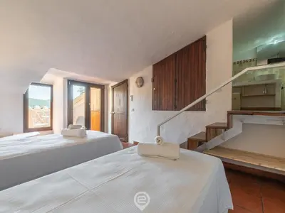 Letto o letti in una camera di Villa La Perla