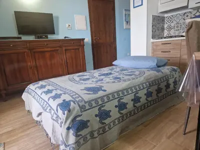 Letto o letti in una camera di Casa Laura vista mare, Best Vacation Ever