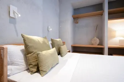 Letto o letti in una camera di Trinità UrbanHaven - Cuore di Cagliari