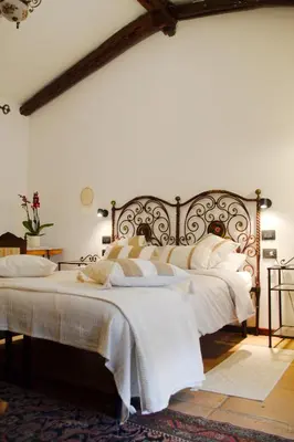 Letto o letti in una camera di Domuseo