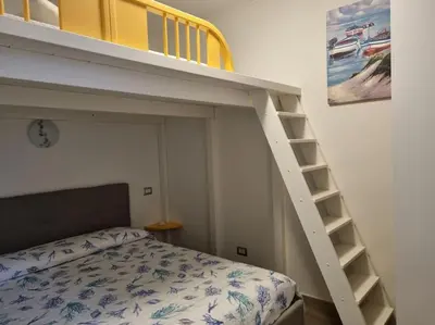 Letto o letti in una camera di Gina House (20 metri dal mare)