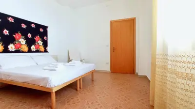 Letto o letti in una camera di I Fenicotteri - Appartamenti Vicino al Mare