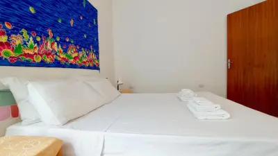 Letto o letti in una camera di I Fenicotteri - Appartamenti Vicino al Mare