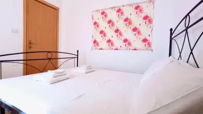 Letto o letti in una camera di I Fenicotteri - Appartamenti Vicino al Mare