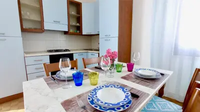 Cucina o angolo cottura di I Fenicotteri - Appartamenti Vicino al Mare