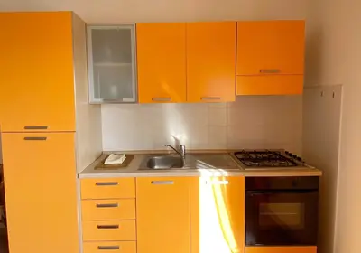 Cucina o angolo cottura di I Fenicotteri - Appartamenti Vicino al Mare