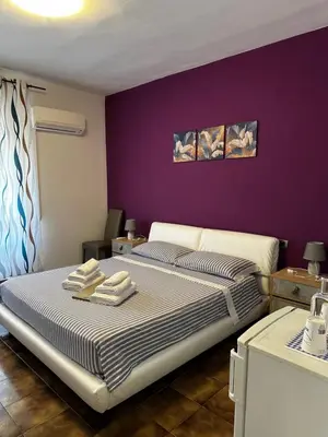 Letto o letti in una camera di Beppo’s Domus
