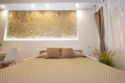 Letto o letti in una camera di Caba's Apartment Best Vacation Ever