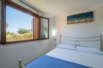 Letto o letti in una camera di Comfort a 4 minuti dal mare- Giardino e bbq