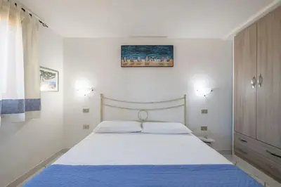 Letto o letti in una camera di Comfort a 4 minuti dal mare- Giardino e bbq