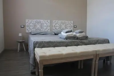Letto o letti in una camera di Casa Janas