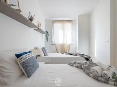 Letto o letti in una camera di Pan Home