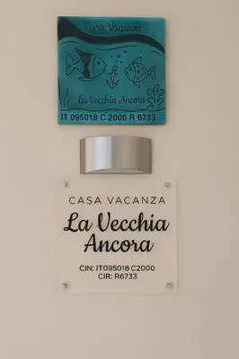Certificato, attestato, insegna o altro documento esposto da Appartamento La Vecchia Ancora Casa Vacanza