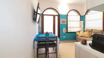 TV o dispositivi per l'intrattenimento presso Appartamento La Vecchia Ancora Casa Vacanza