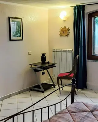 Letto o letti in una camera di Monti e Mare