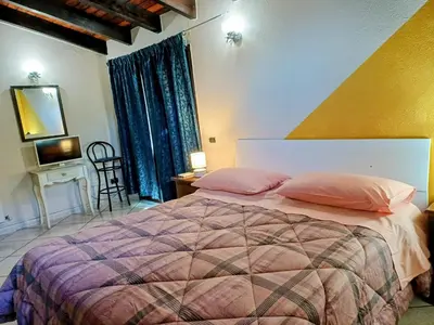 Letto o letti in una camera di Monti e Mare