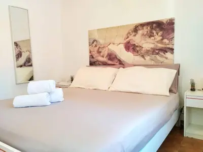 Letto o letti in una camera di Casa Arianna (Borgo Rocce Rosse Arbatax)