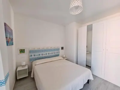 Letto o letti in una camera di Ma.Vi Casa Vacanze