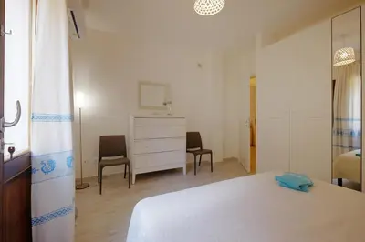 Letto o letti in una camera di Ma.Vi Casa Vacanze