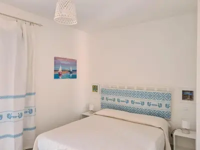 Letto o letti in una camera di Ma.Vi Casa Vacanze