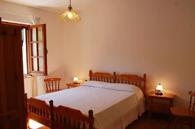Letto o letti in una camera di Appartamento con terrazza vista mare a Maladroxia C51