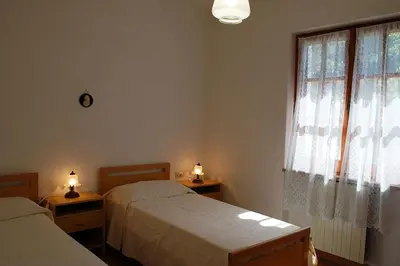 Letto o letti in una camera di Appartamento con terrazza vista mare a Maladroxia C51