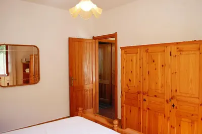 Letto o letti in una camera di Appartamento con terrazza vista mare a Maladroxia C51