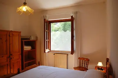 Letto o letti in una camera di Appartamento con terrazza vista mare a Maladroxia C51