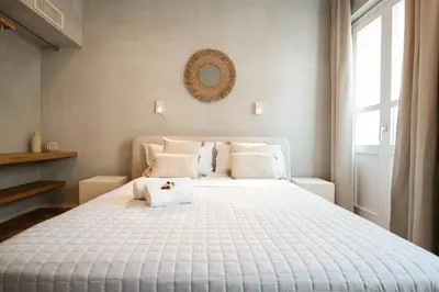 Letto o letti in una camera di Trinità Rooftop - Cuore di Cagliari