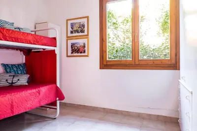 Letto o letti in una camera di Casa Bea - free wifi - vista mare