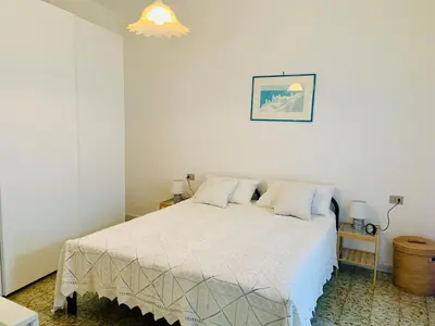 Letto o letti in una camera di Casa Assunta
