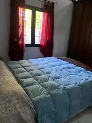 Letto o letti in una camera di Su Giardinu