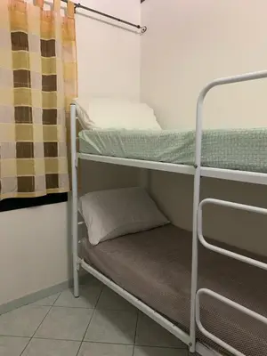 Letto o letti in una camera di Su Giardinu