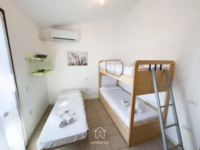 Letto o letti in una camera di Maison Maria