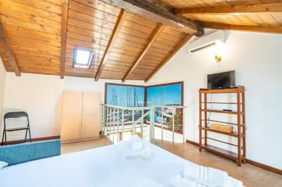 Letto o letti in una camera di Palazzo Boyer - Marina - 6 posti