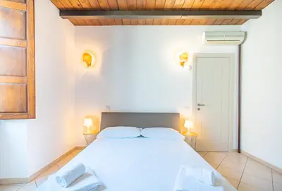 Letto o letti in una camera di Palazzo Boyer - Marina - 6 posti