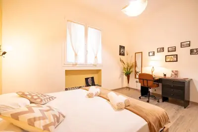 Letto o letti in una camera di Harmony - Via Bottego - Fra centro storico e mare