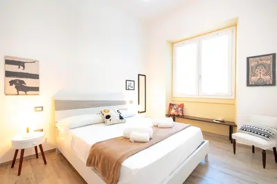 Letto o letti in una camera di Harmony - Via Bottego - Fra centro storico e mare