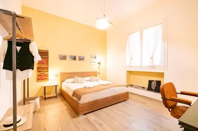 Letto o letti in una camera di Harmony - Via Bottego - Fra centro storico e mare