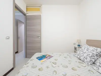 Letto o letti in una camera di Apartment Porru by Interhome