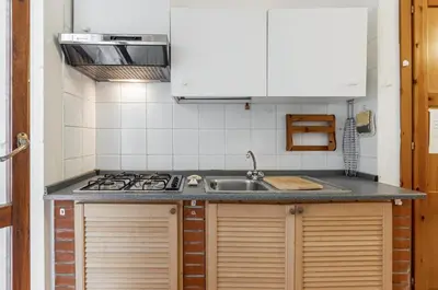 Cucina o angolo cottura di GuestHost - Il Mandorleto Villasimius Roomy Apt