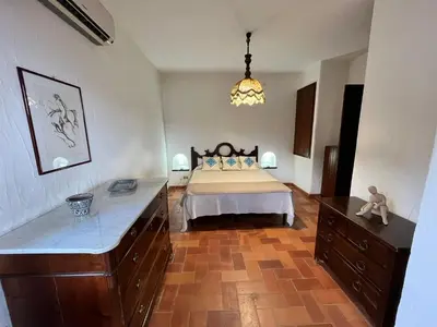 Letto o letti in una camera di Villa Giulia 3 Levels