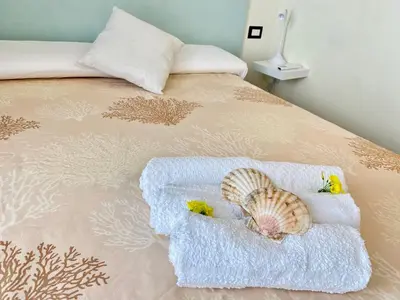 Letto o letti in una camera di Domu Su Neulaghe