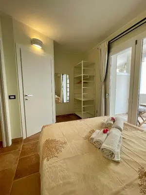 Letto o letti in una camera di Domu Su Neulaghe
