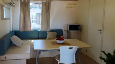 Area soggiorno di Camping Village S'Ena Arrubia