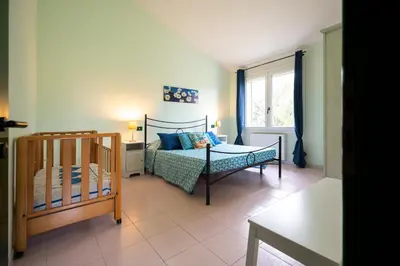 Letto o letti in una camera di Home Appi Family
