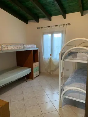 Letto o letti in una camera di Sa cruxi